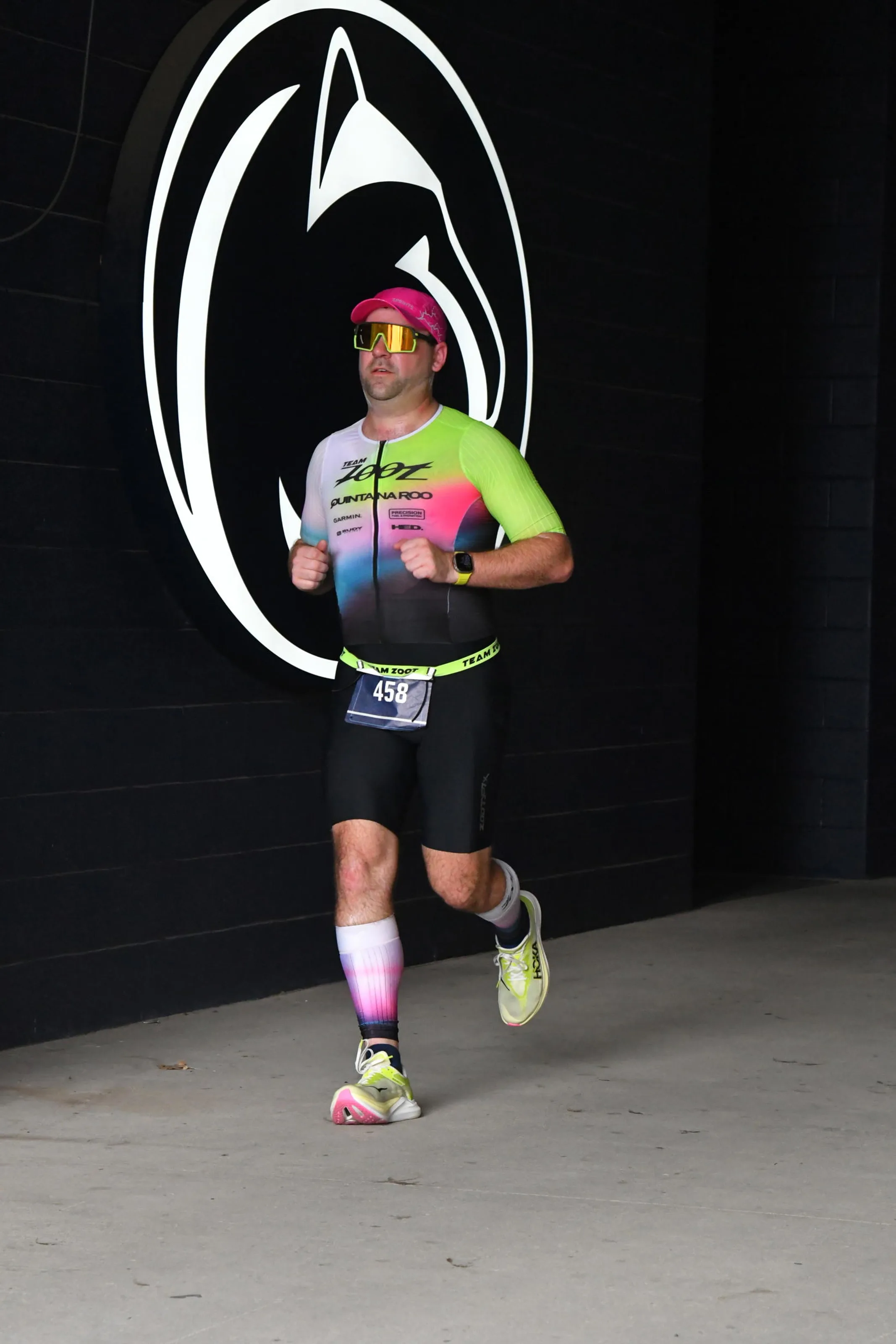 Running in front of the Penn State Logo